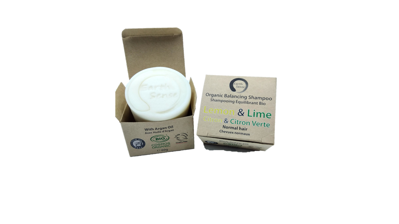 Bar of soap in a cardboard box with a label on a white background