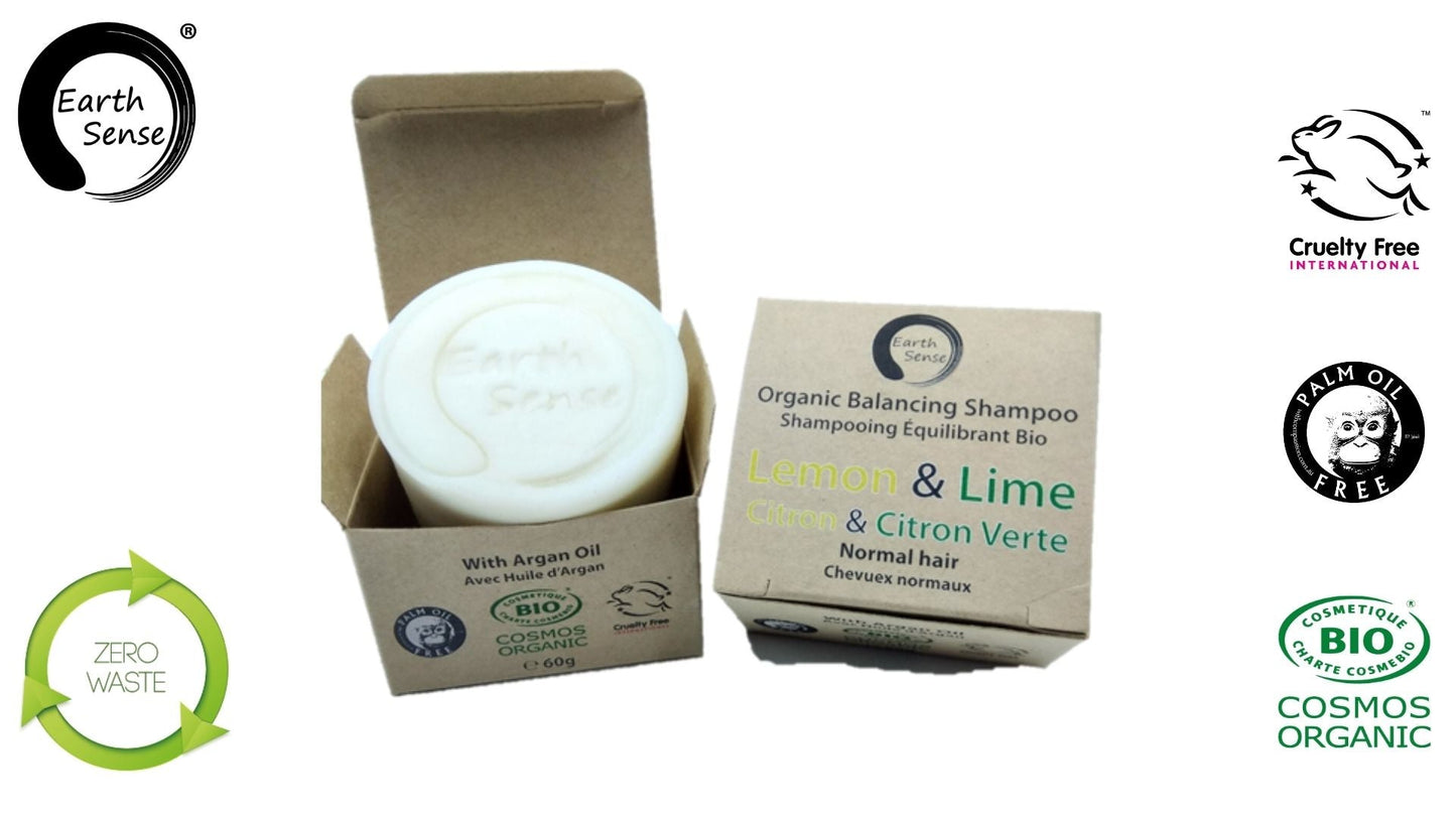Earth Sense organic shampoo bar with packaging and certification logos on a white background