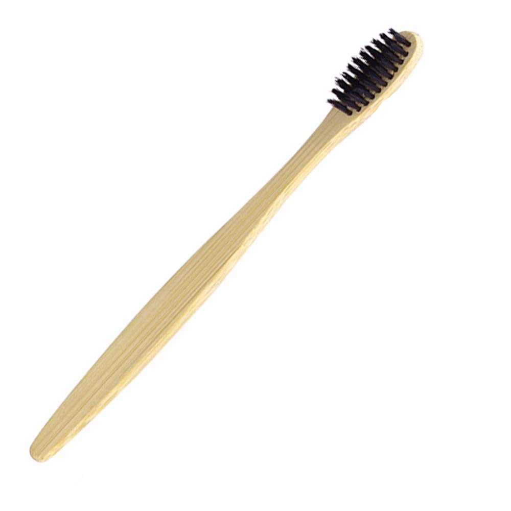 Bamboo toothbrush with black bristles on a white background