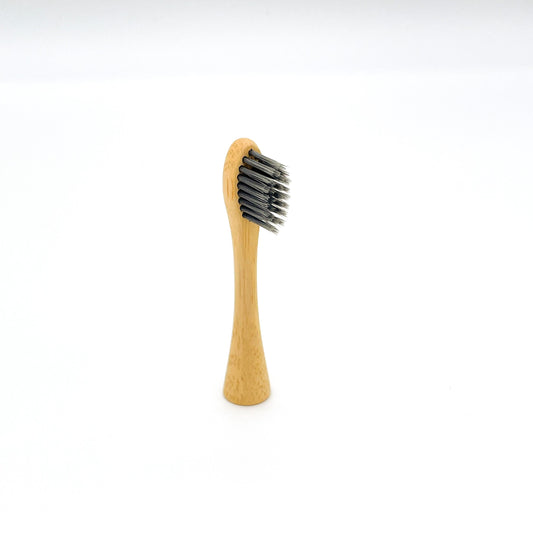 Eco-friendly toothbrush heads with charcoal bristles