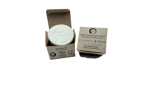 Bar of soap in a brown box with a label on a white background