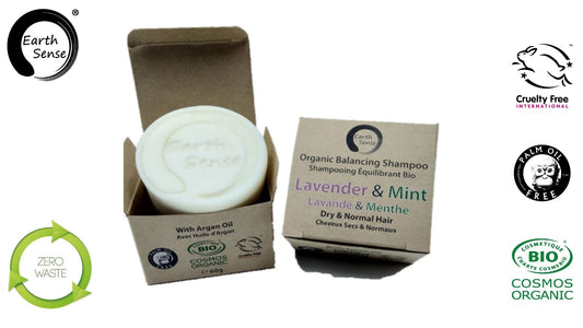 Earth Sense organic shampoo bar with packaging on a white background