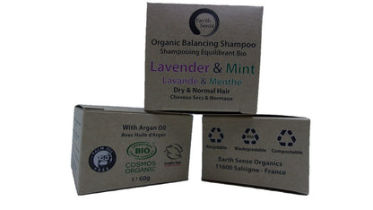 Three boxes of Organic Balancing Shampoo with Lavender & Mint scent on a white background