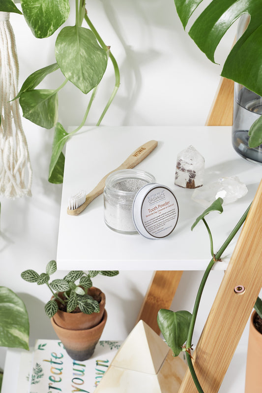Organic tooth powder in glass jar with eco packaging