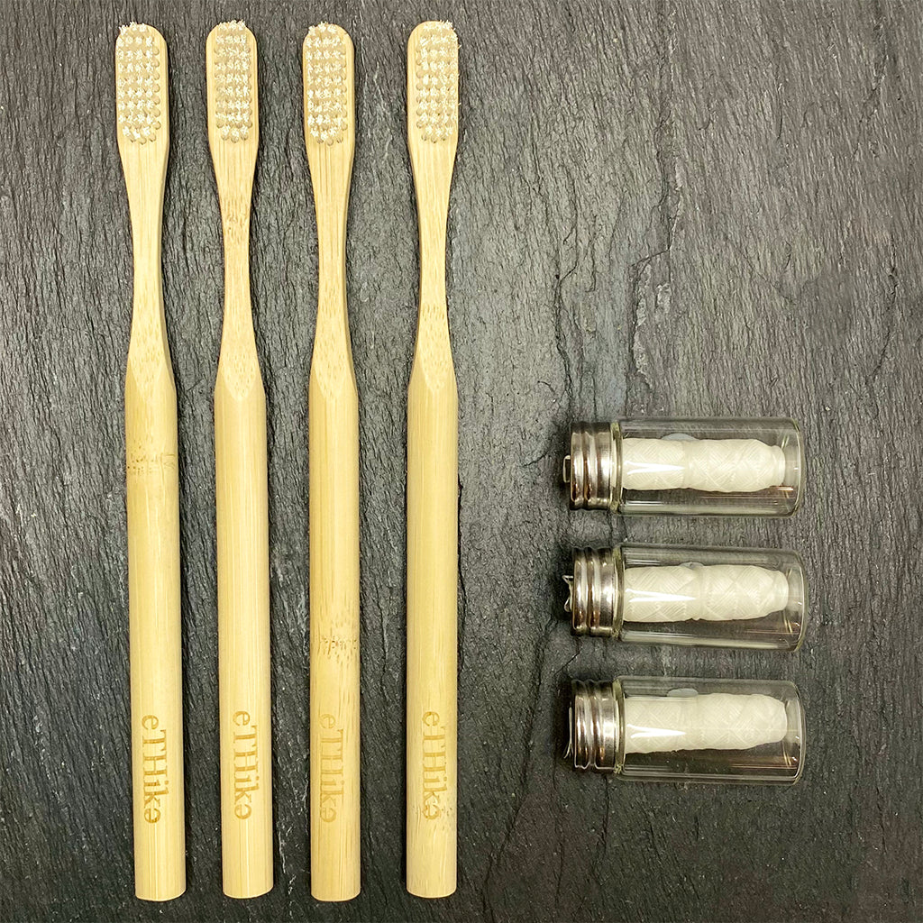 Zero waste oral hygiene kit with bamboo toothbrushes and floss