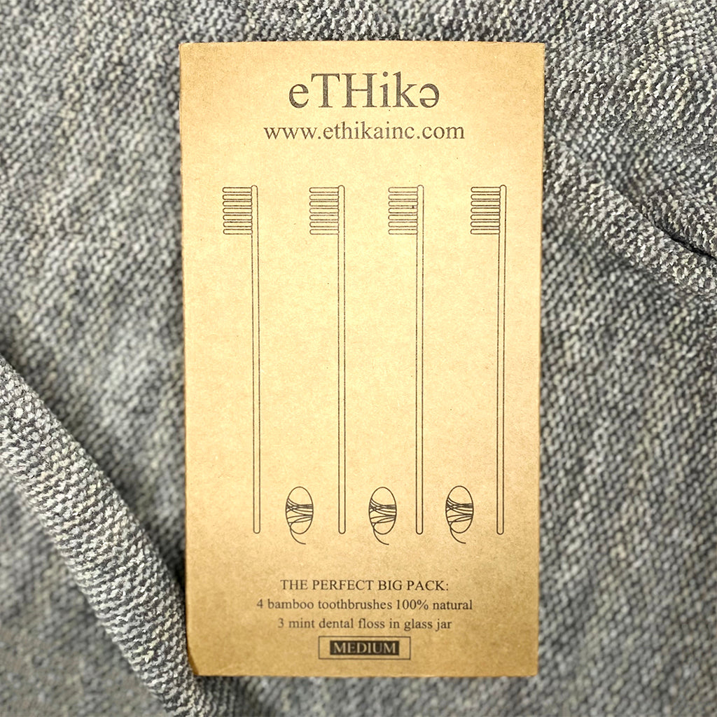 Compostable toothbrush and natural floss oral care kit