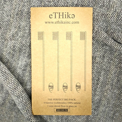 Compostable toothbrush and natural floss oral care kit